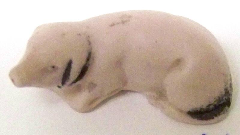 Reclining Pig Figurine