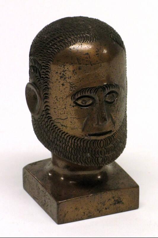 Unidentified Man Figurine