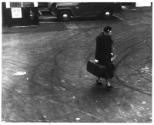 Eleanor Roosevelt carrying her suitcase at LaGuardia Airport, New York, New York. Lawrence W. J…